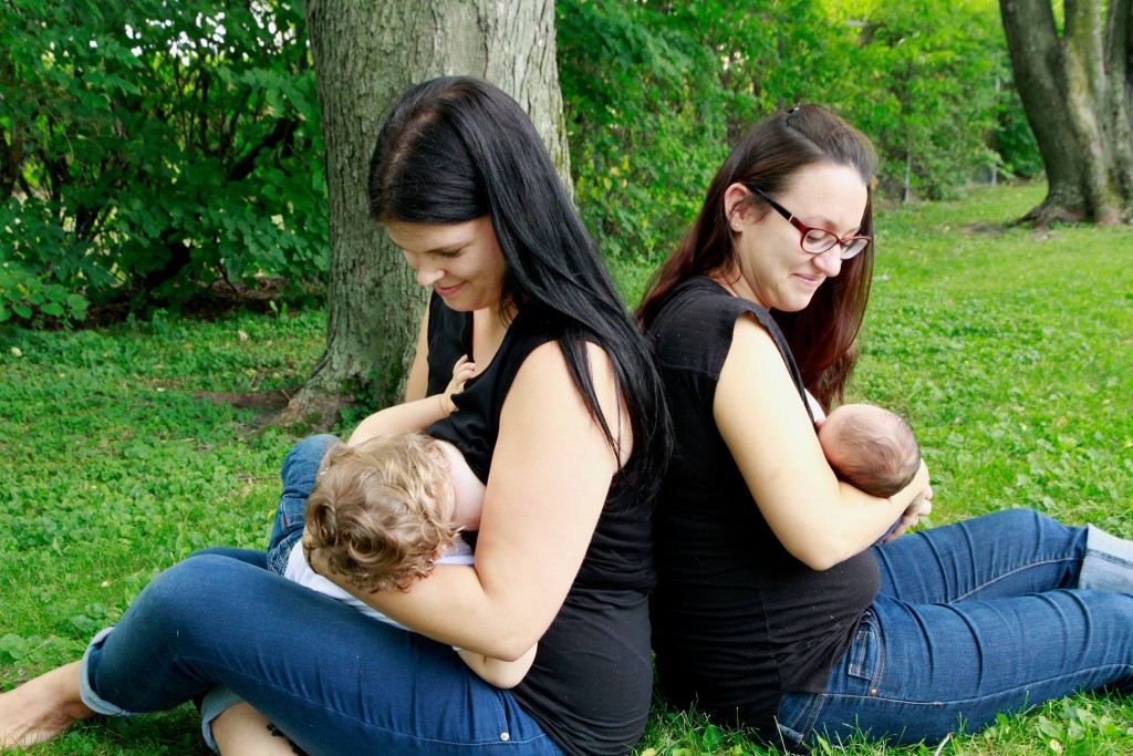 Annie B. C. - Here is me breastfeeding our 13 months old son (left), and my girlfriend breastfeeding our 8 days old son (right). I carried our older and she carried our younger. SO MUCH LOVE :)